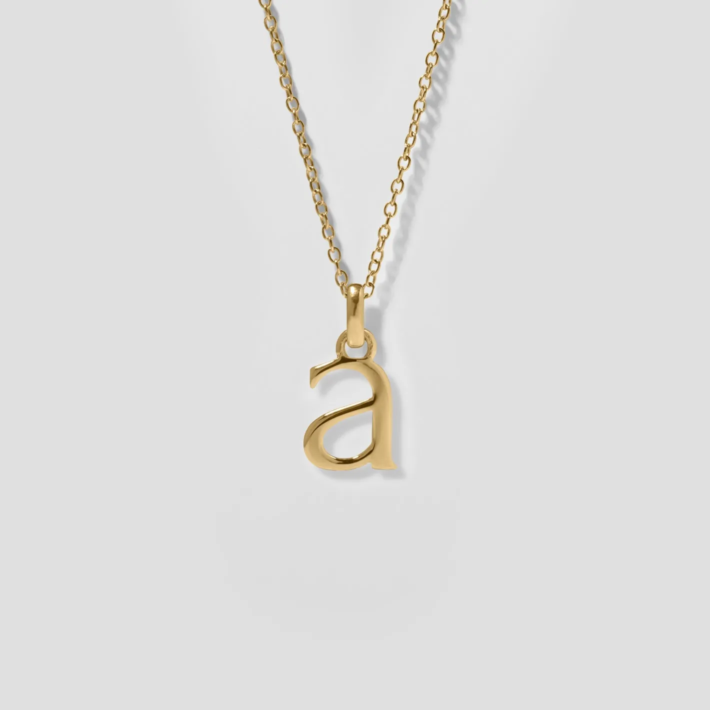 Store STILNEST Initial mit Ankerkette | 585 Gold