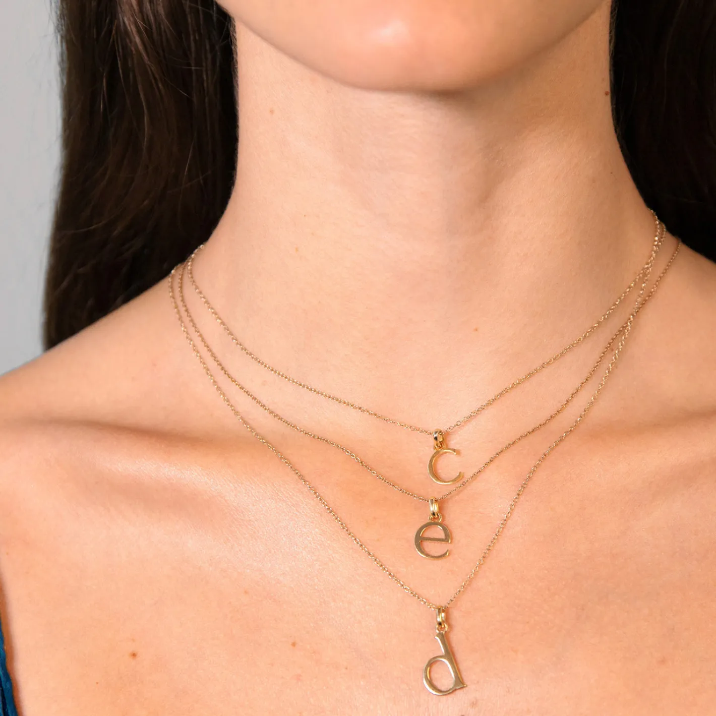 Store STILNEST Initial mit Ankerkette | 585 Gold