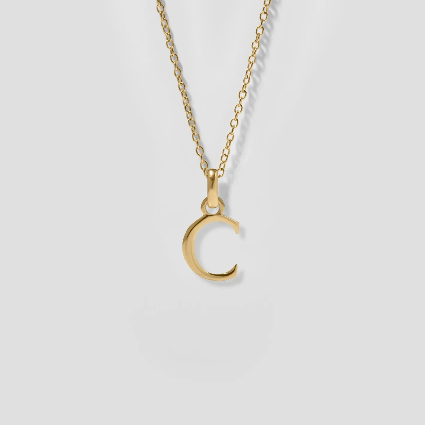 Store STILNEST Initial mit Ankerkette | 585 Gold