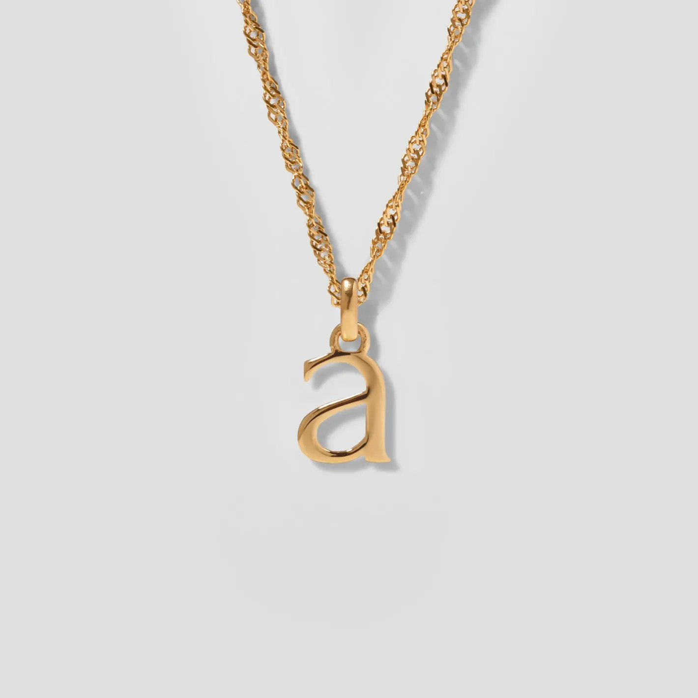 Store STILNEST Initial mit Singapore Kette