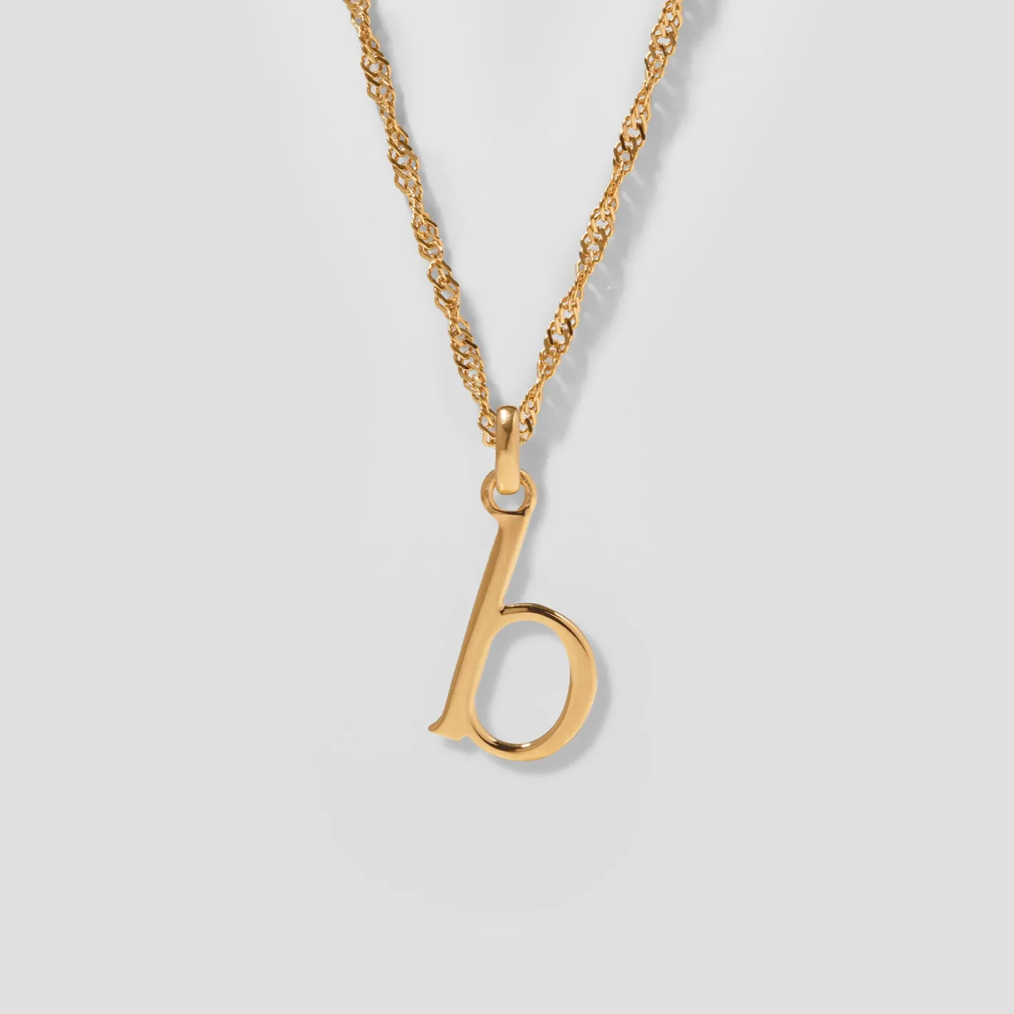 Store STILNEST Initial mit Singapore Kette