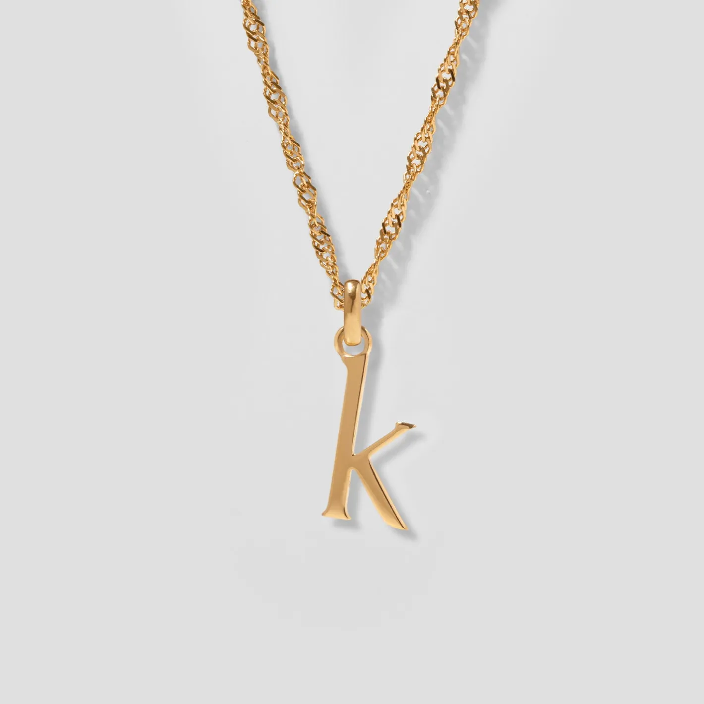 Store STILNEST Initial mit Singapore Kette
