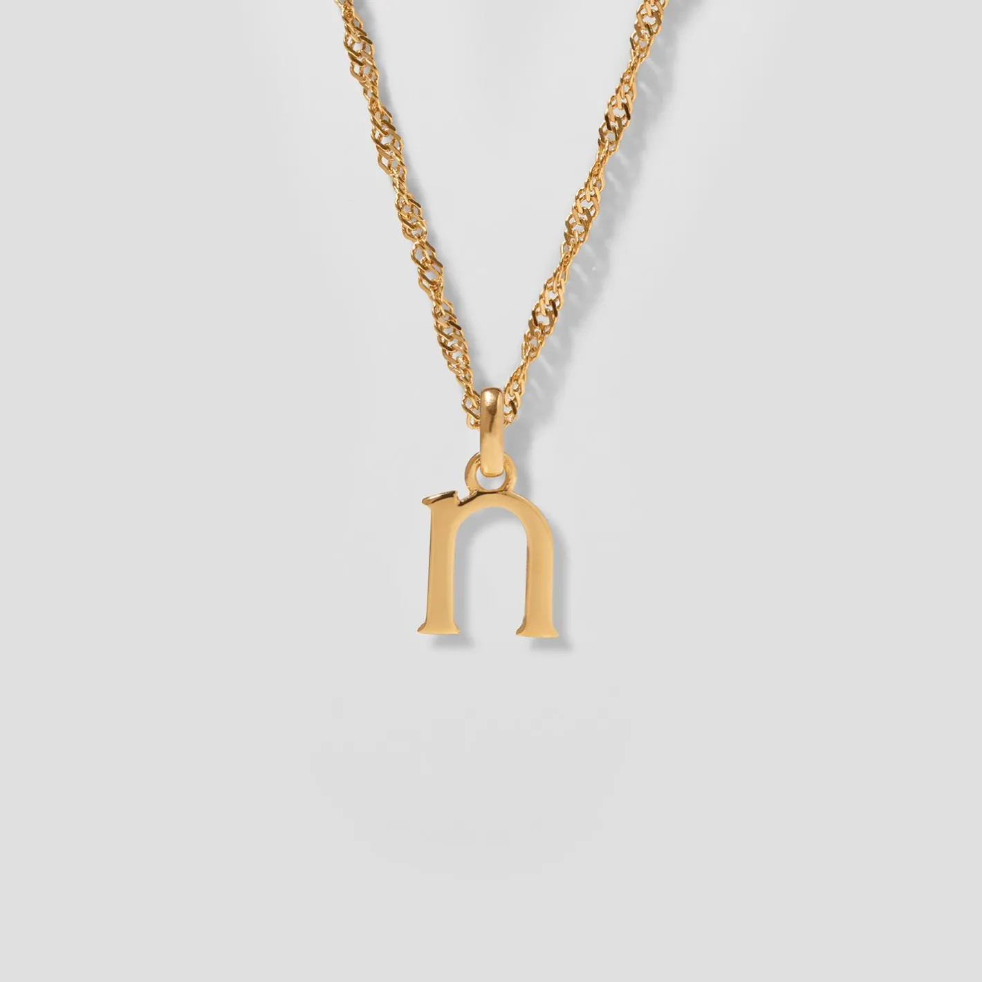 Store STILNEST Initial mit Singapore Kette