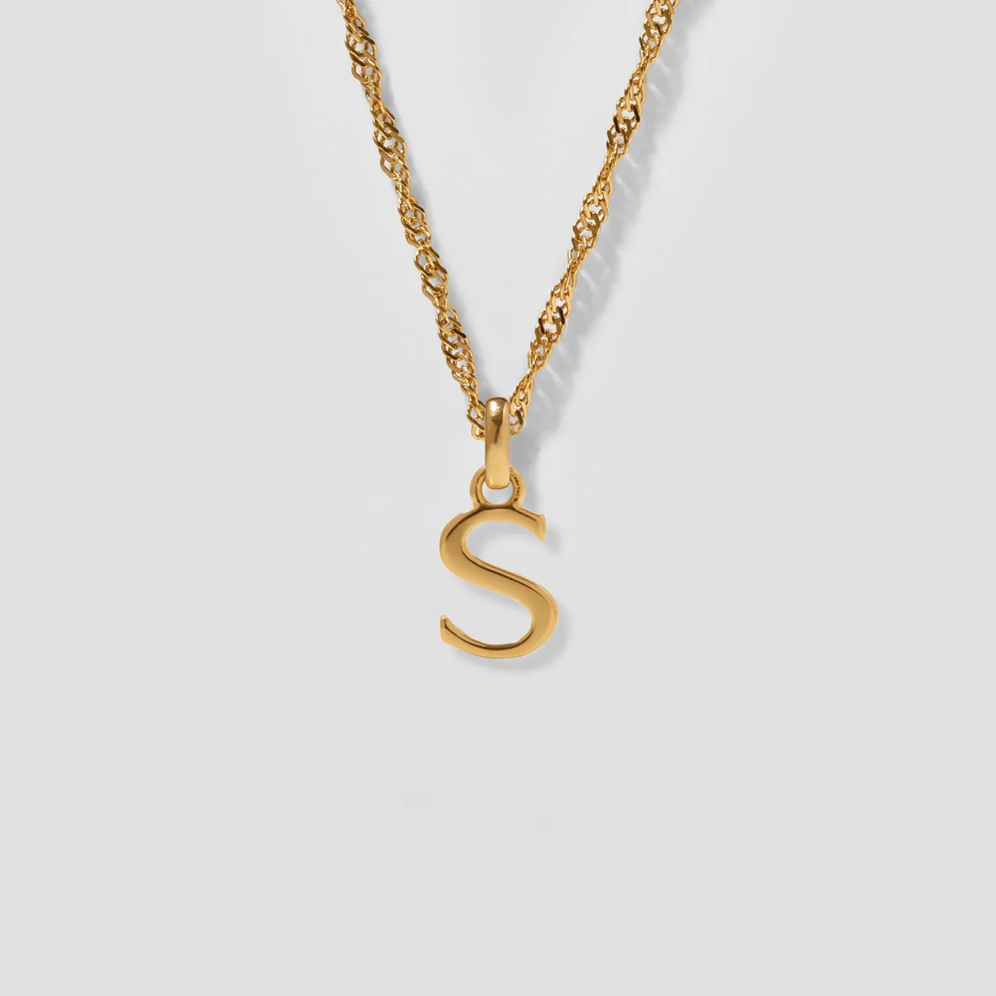Store STILNEST Initial mit Singapore Kette