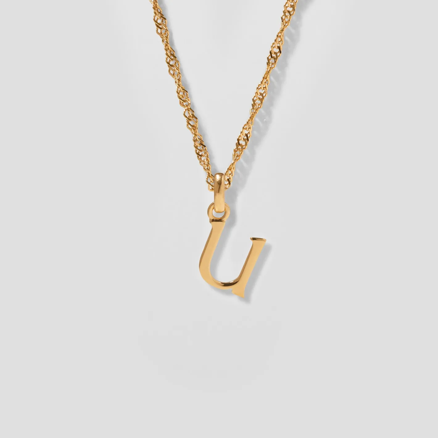 Store STILNEST Initial mit Singapore Kette