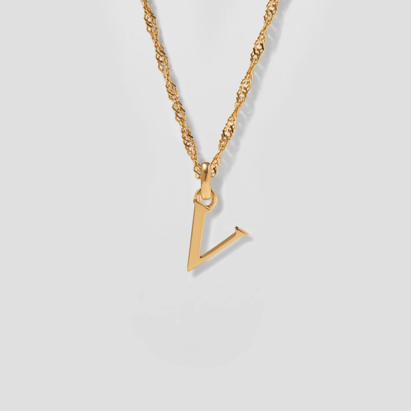 Store STILNEST Initial mit Singapore Kette
