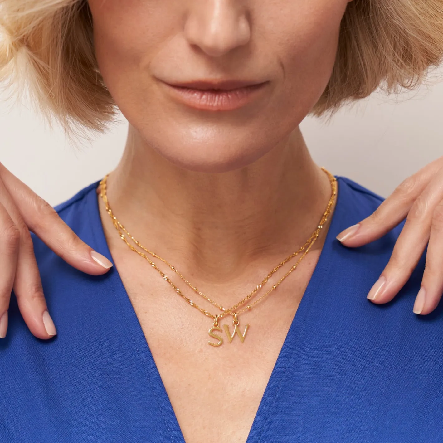 Store STILNEST Initial mit Singapore Kette