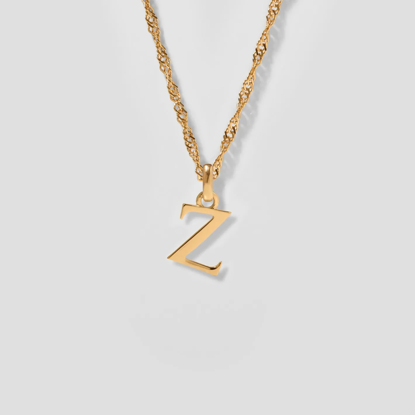 Store STILNEST Initial mit Singapore Kette