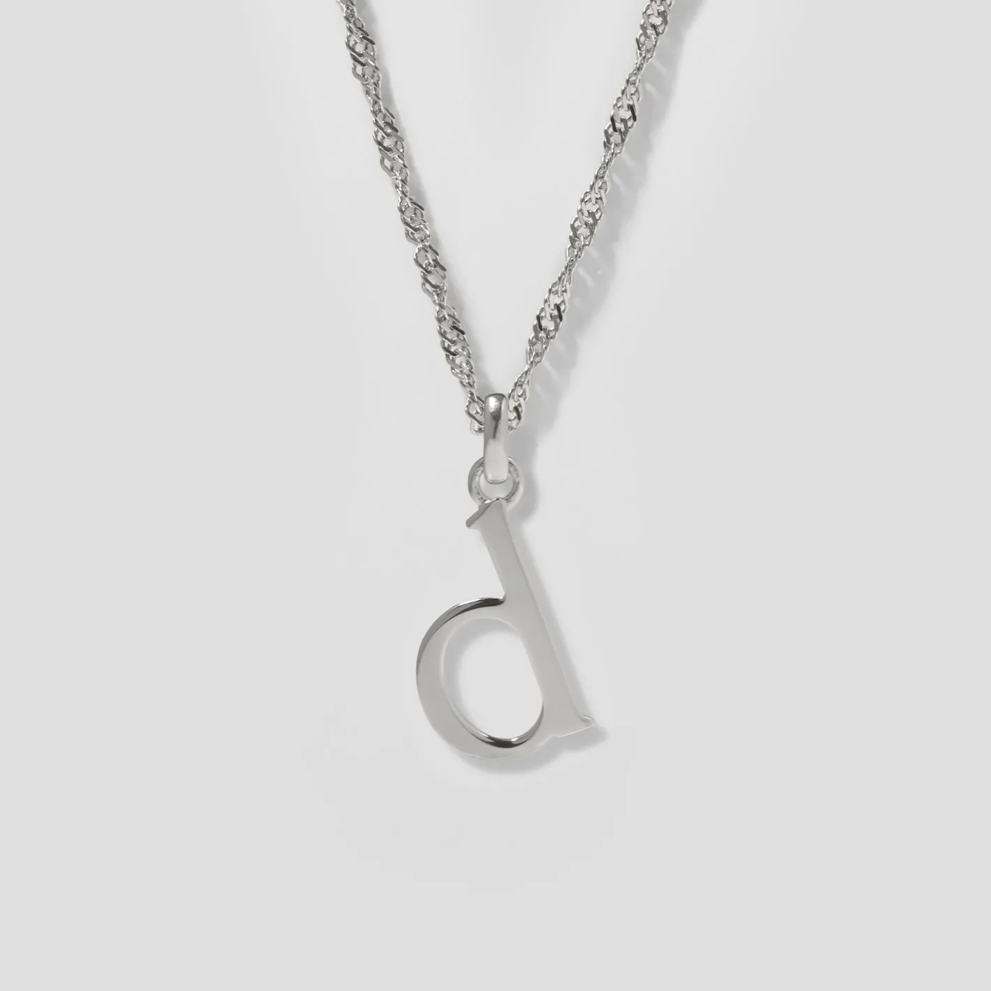 Store STILNEST Initial mit Singapore Kette