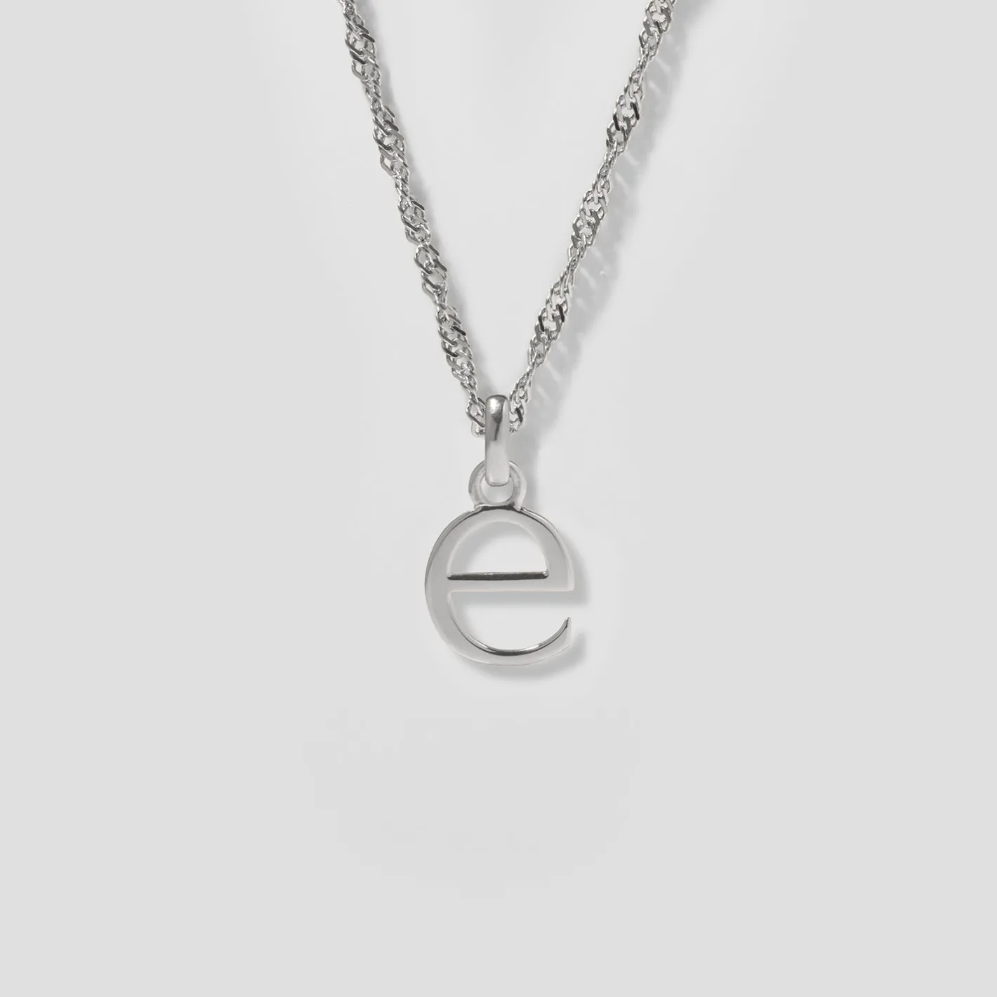 Store STILNEST Initial mit Singapore Kette