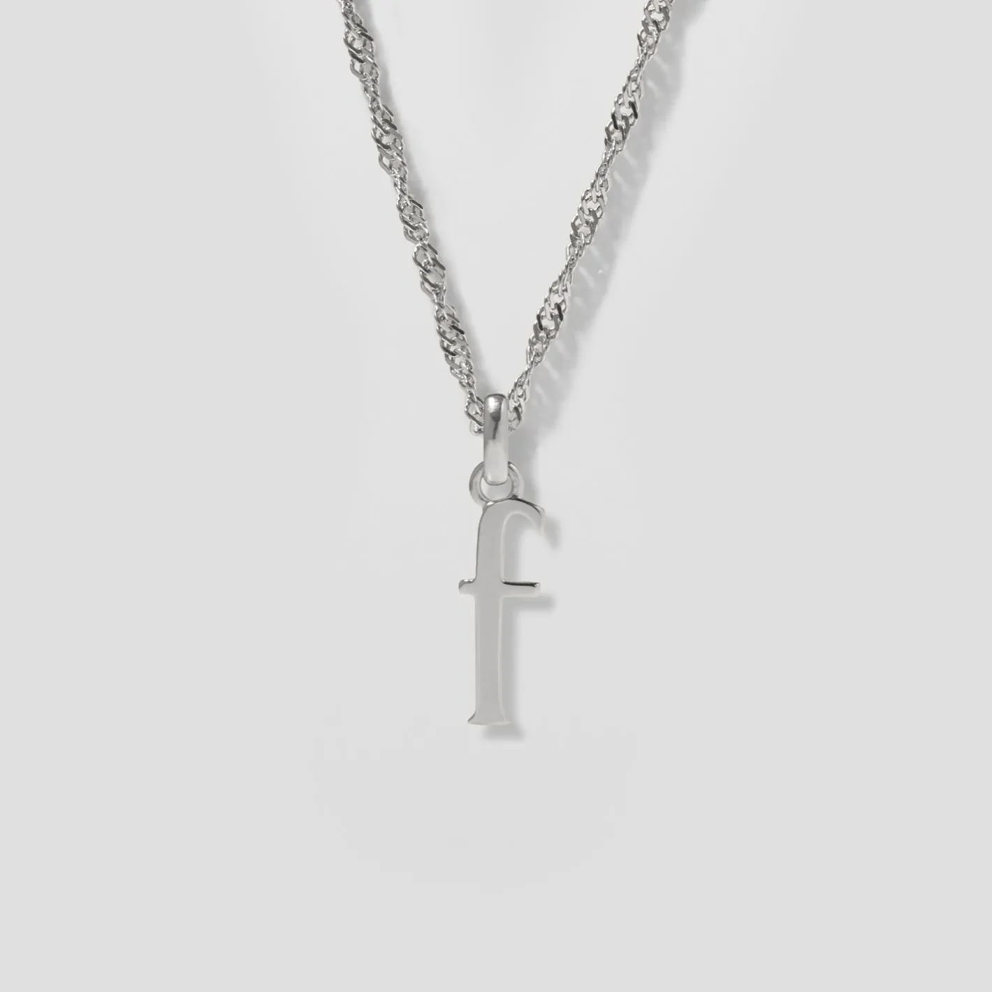 Store STILNEST Initial mit Singapore Kette