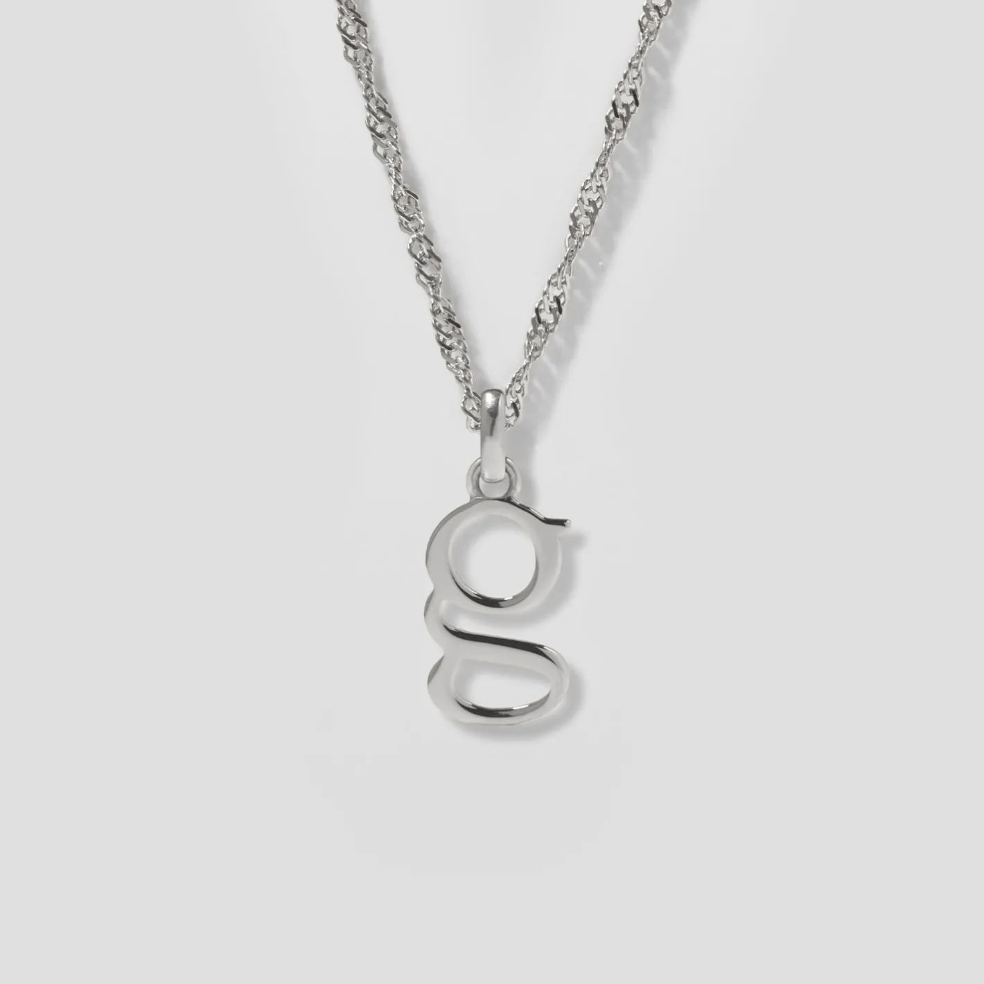 Store STILNEST Initial mit Singapore Kette