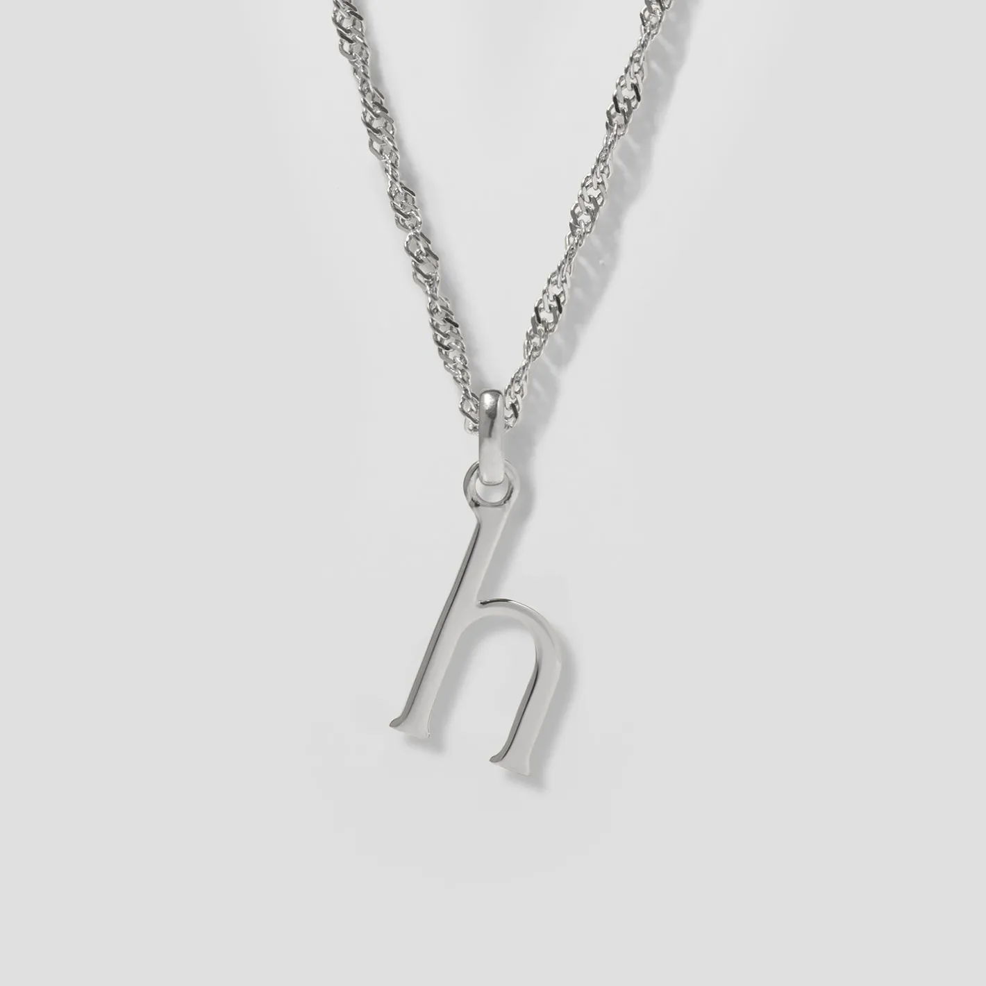 Store STILNEST Initial mit Singapore Kette