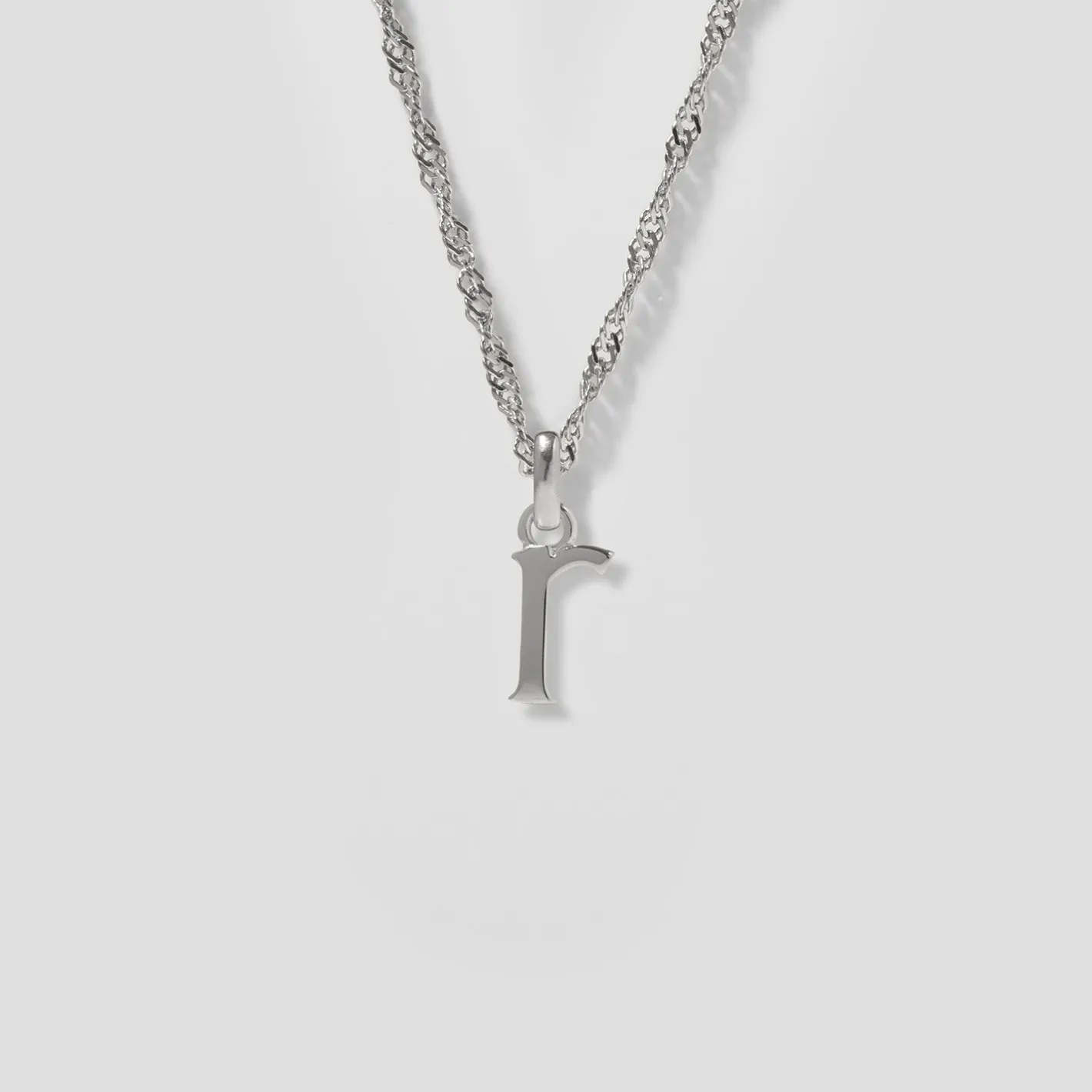 Store STILNEST Initial mit Singapore Kette