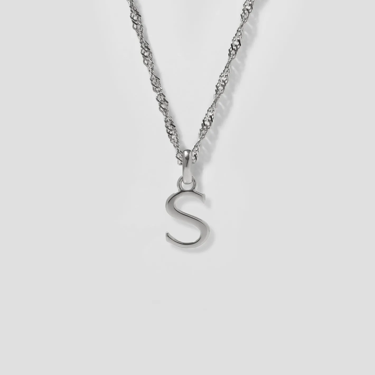 Store STILNEST Initial mit Singapore Kette