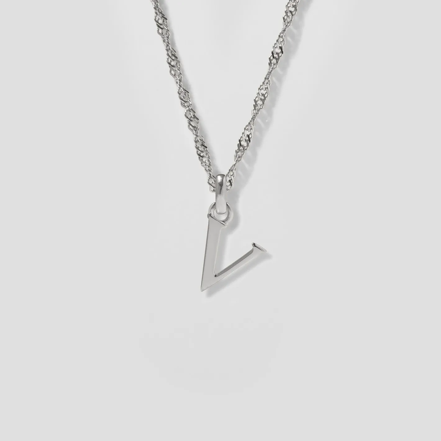 Store STILNEST Initial mit Singapore Kette