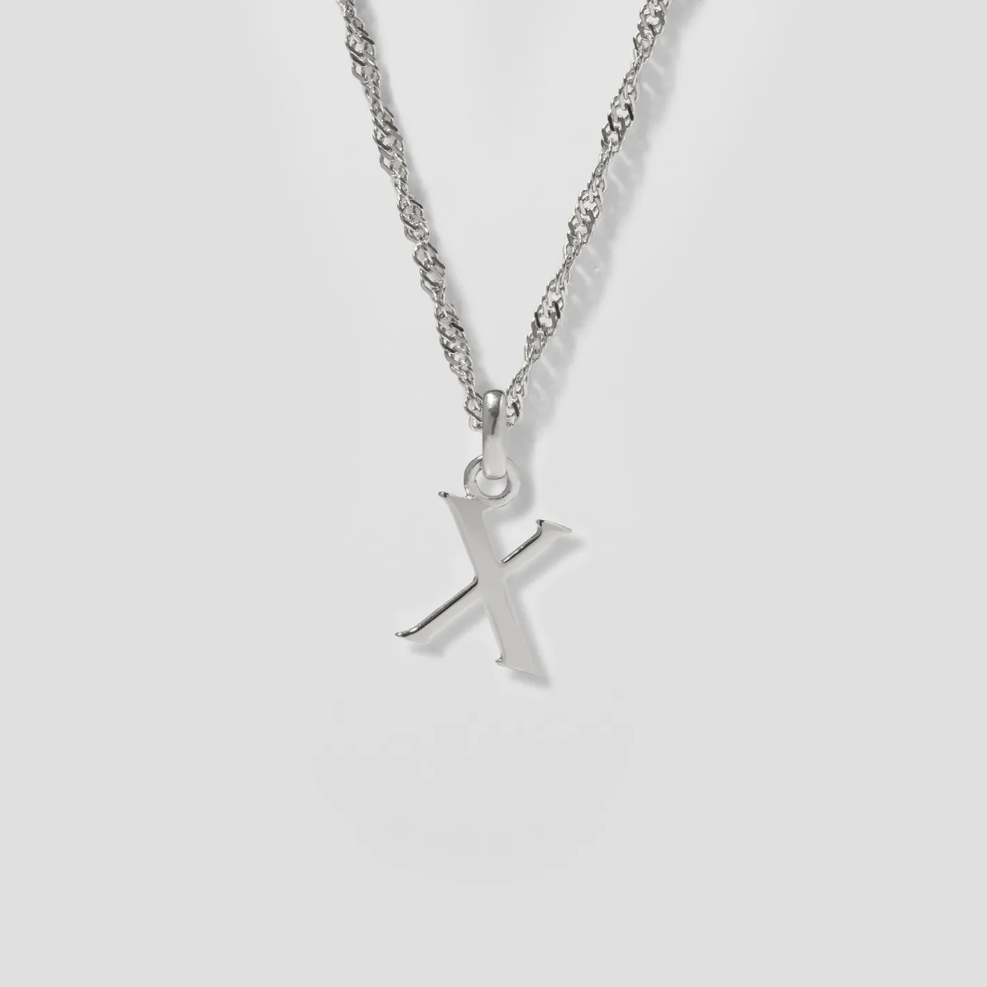 Store STILNEST Initial mit Singapore Kette