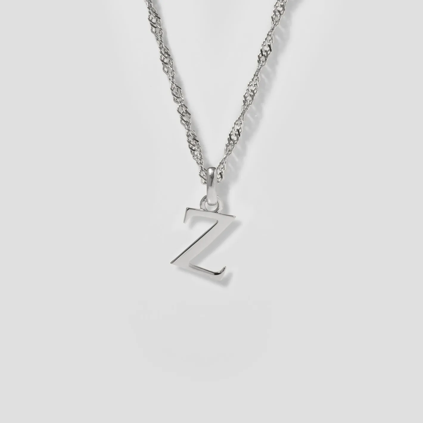 Store STILNEST Initial mit Singapore Kette