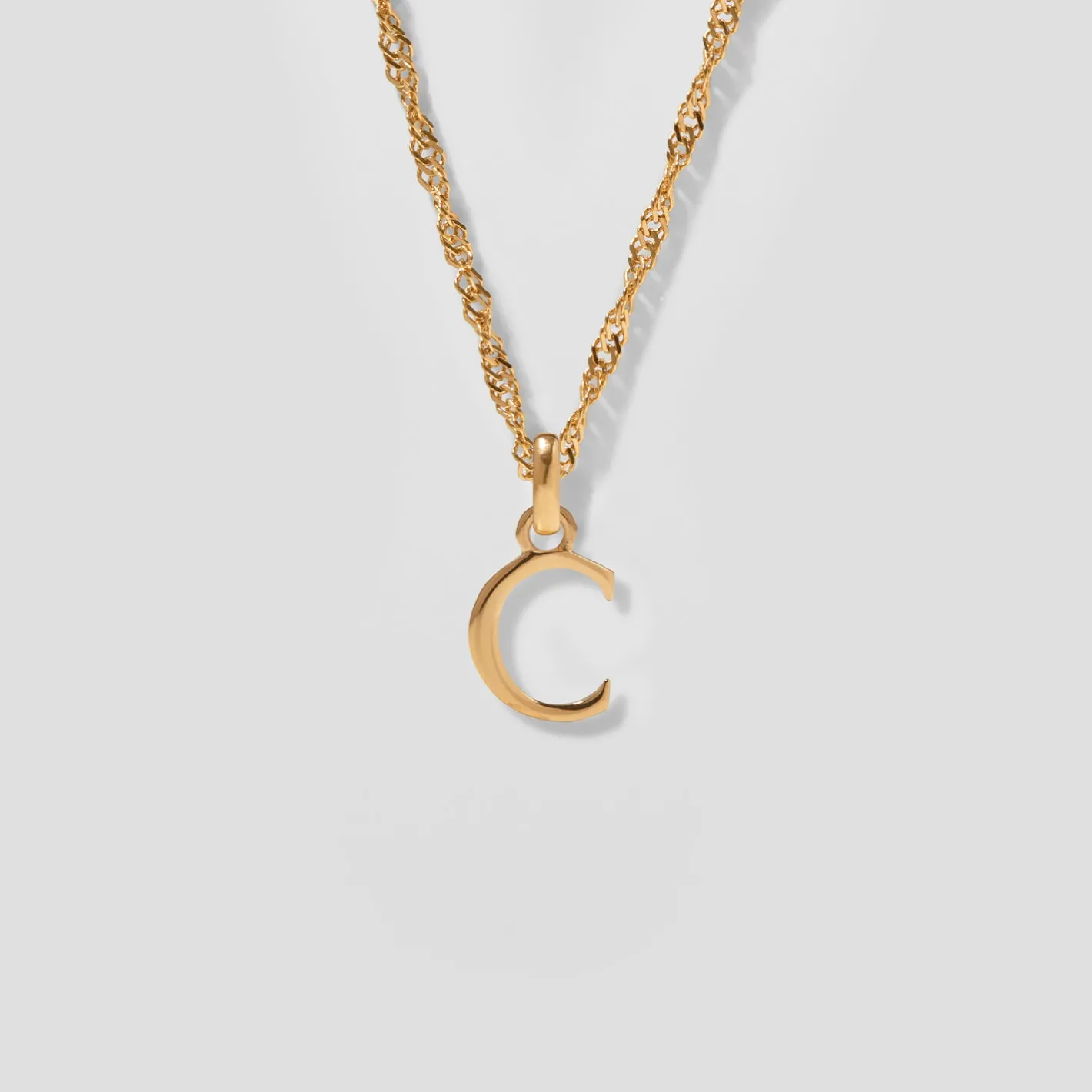 Store STILNEST Initial mit Singapore Kette