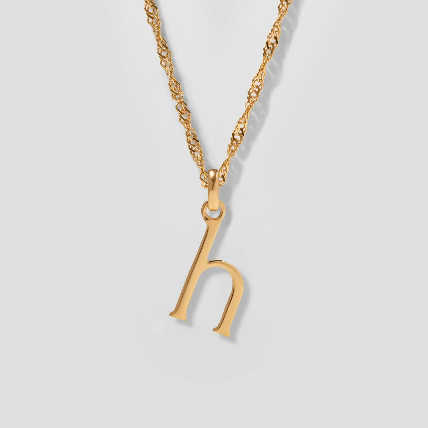 Store STILNEST Initial mit Singapore Kette